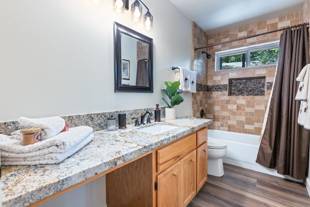 39398 Robin, Bass Lake, CA 93604 - full bath with shower / bathtub combination with curtain, vanity, wood finished floors, and toilet