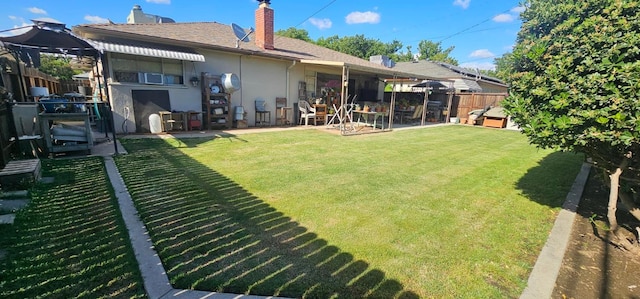 3356 E Austin Way, Fresno, CA 93726 - back of house with stucco siding, a chimney, a gazebo, and a patio area
