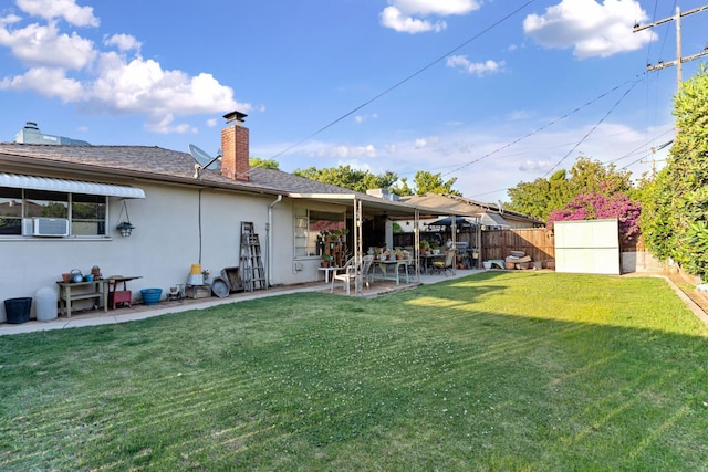 3356 E Austin Way, Fresno, CA 93726 - rear view of house featuring a patio area, stucco siding, a chimney, and roof with shingles