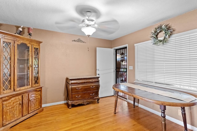 3356 E Austin Way, Fresno, CA 93726 - office area with a ceiling fan, light wood-type flooring, and baseboards