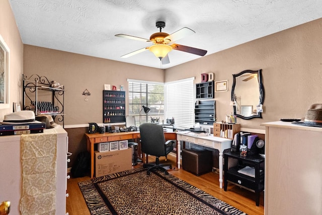 3356 E Austin Way, Fresno, CA 93726 - office space with wood finished floors, a ceiling fan, and a textured ceiling
