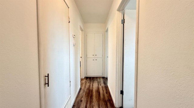1380 Elaine Dr, Hanford, CA 93230 - hallway with dark wood-style floors and a textured wall