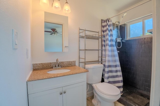 1380 Elaine Dr, Hanford, CA 93230 - bathroom featuring a tile shower, vanity, and ceiling fan
