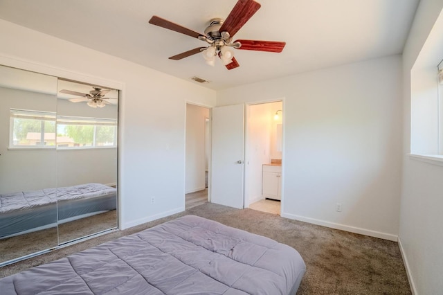 1380 Elaine Dr, Hanford, CA 93230 - carpeted bedroom featuring a closet and a ceiling fan