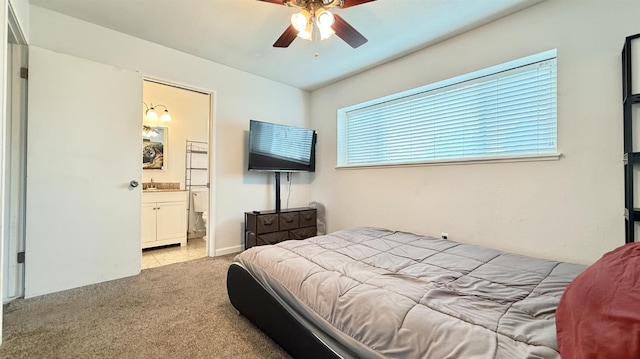 1380 Elaine Dr, Hanford, CA 93230 - bedroom with light colored carpet, a sink, light tile patterned floors, ensuite bathroom, and ceiling fan