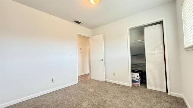 1380 Elaine Dr, Hanford, CA 93230 - unfurnished bedroom with carpet, baseboards, and a closet