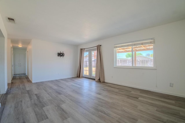 1380 Elaine Dr, Hanford, CA 93230 - unfurnished room with wood finished floors and baseboards