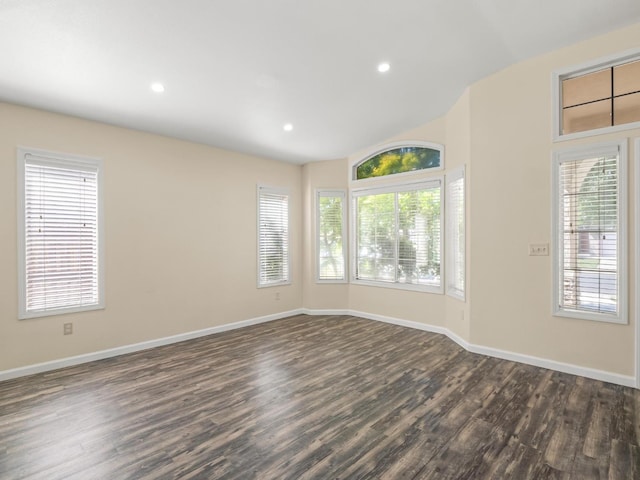 5611 W Carmen Ave, Fresno, CA 93722 - spare room featuring dark wood-style flooring, baseboards, and recessed lighting