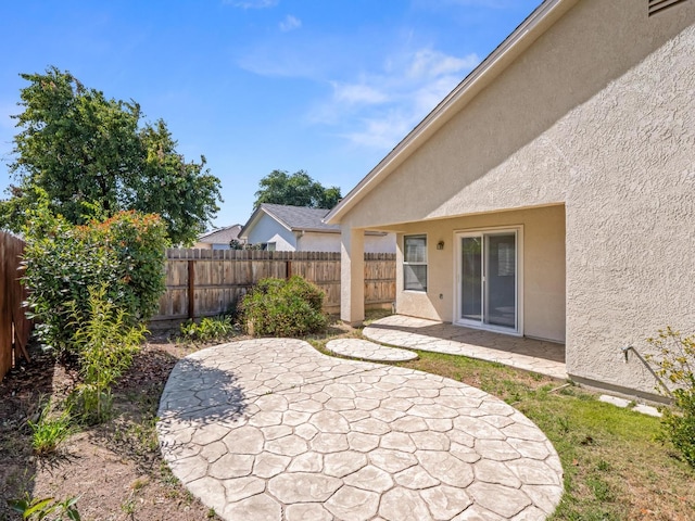 5611 W Carmen Ave, Fresno, CA 93722 - view of patio featuring a fenced backyard