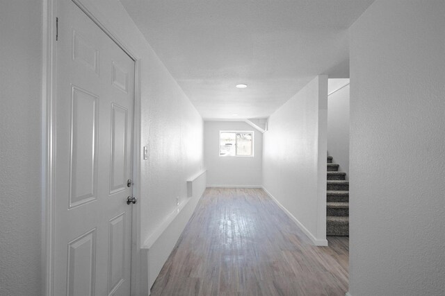 15758 Mark Rd, Madera, CA 93636 - hallway featuring stairs and wood finished floors