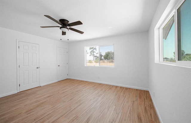 15758 Mark Rd, Madera, CA 93636 - empty room with light wood-style flooring and a ceiling fan