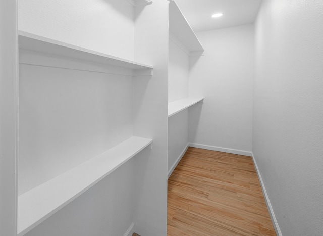 15758 Mark Rd, Madera, CA 93636 - walk in closet featuring light wood finished floors