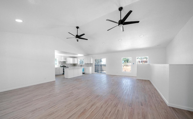 15758 Mark Rd, Madera, CA 93636 - unfurnished living room featuring a ceiling fan, light wood-style floors, recessed lighting, and high vaulted ceiling
