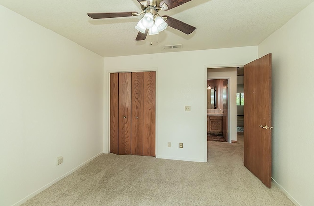 15501 Garlock Ln, Prather, CA 93651 - unfurnished bedroom featuring carpet, a closet, baseboards, and a ceiling fan
