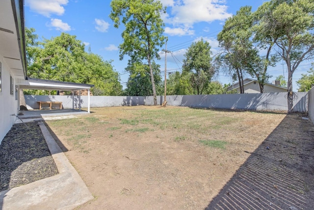 336 W Locust Ave, Pinedale, CA 93650 - fenced backyard with a patio area
