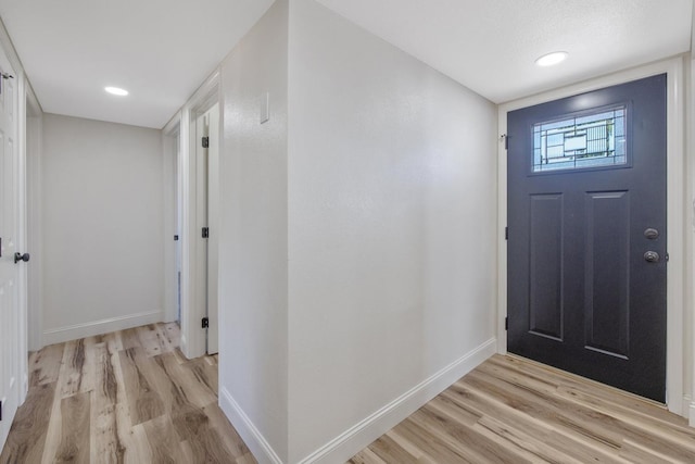 336 W Locust Ave, Pinedale, CA 93650 - entrance foyer featuring light wood-style floors, baseboards, and recessed lighting