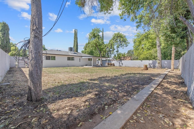 336 W Locust Ave, Pinedale, CA 93650 - fenced backyard featuring a patio area