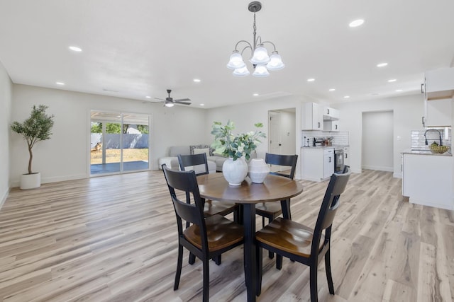 336 W Locust Ave, Pinedale, CA 93650 - dining area featuring recessed lighting, light wood-style floors, a ceiling fan, a chandelier, and baseboards