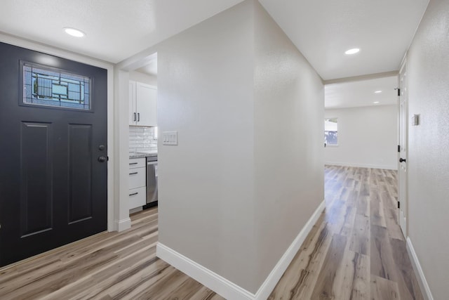 336 W Locust Ave, Pinedale, CA 93650 - entryway featuring light wood-type flooring, baseboards, and recessed lighting