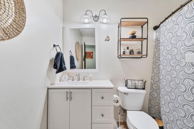 5532 W Indianapolis Ave, Fresno, CA 93722 - full bath featuring toilet, vanity, and a shower with curtain
