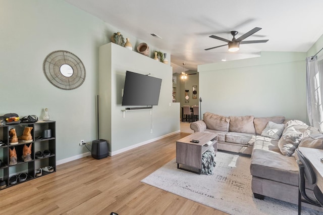 5532 W Indianapolis Ave, Fresno, CA 93722 - living area with ceiling fan, wood finished floors, and baseboards