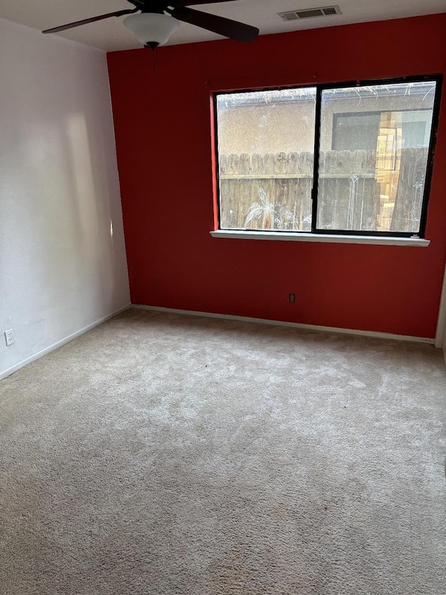 413 Buckeye Springs St, Coalinga, CA 93210 - carpeted spare room with ceiling fan and baseboards