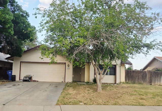 413 Buckeye Springs St, Coalinga, CA 93210 - view of front of home featuring concrete driveway and a garage