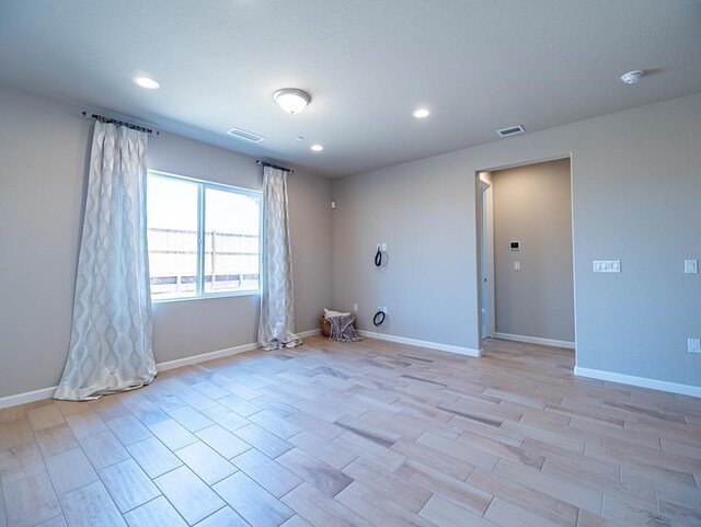 873 Beaver Pond Loop, Madera, CA 93636 - spare room with light wood finished floors, recessed lighting, baseboards, and a smoke detector