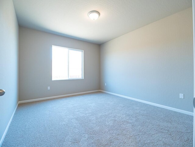 873 Beaver Pond Loop, Madera, CA 93636 - carpeted spare room featuring baseboards