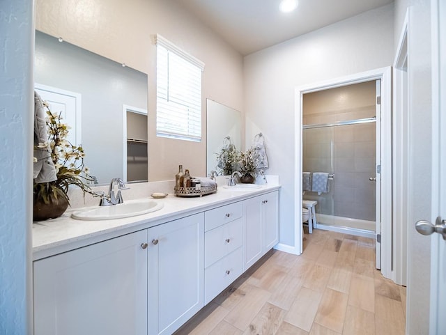 873 Beaver Pond Loop, Madera, CA 93636 - full bathroom featuring a stall shower and double vanity