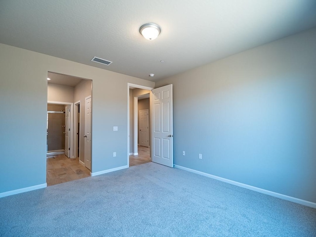 873 Beaver Pond Loop, Madera, CA 93636 - unfurnished bedroom featuring baseboards and carpet flooring