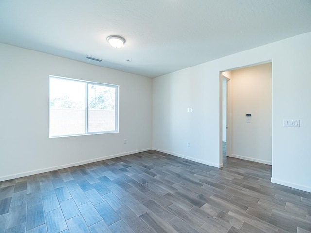878 Beaver Pond Loop, Madera, CA 93636 - spare room featuring wood finished floors and baseboards
