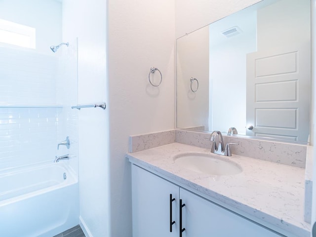 878 Beaver Pond Loop, Madera, CA 93636 - bathroom with shower / bathtub combination and vanity