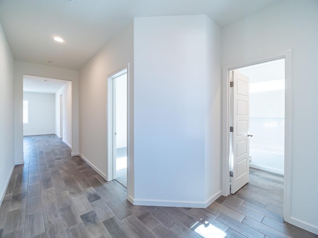 878 Beaver Pond Loop, Madera, CA 93636 - hall with wood finished floors, recessed lighting, and baseboards