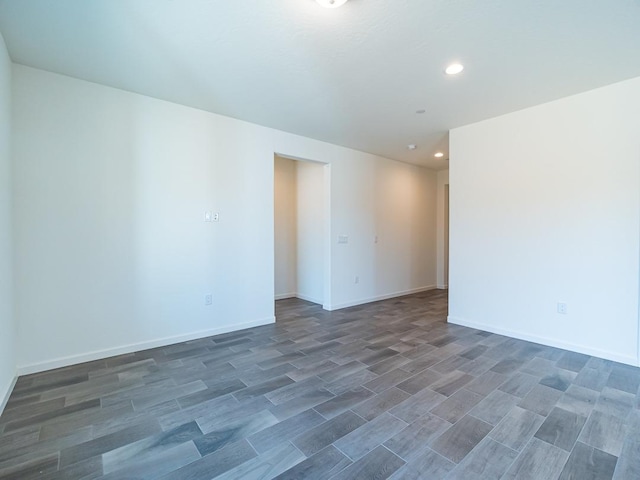 878 Beaver Pond Loop, Madera, CA 93636 - spare room with recessed lighting, wood finished floors, and baseboards