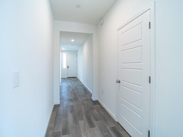 878 Beaver Pond Loop, Madera, CA 93636 - corridor with dark wood-type flooring, baseboards, and recessed lighting