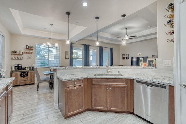 716 Mesa Dr S, Madera, CA 93636 - kitchen with dishwasher, a tray ceiling, a sink, light wood-type flooring, and crown molding