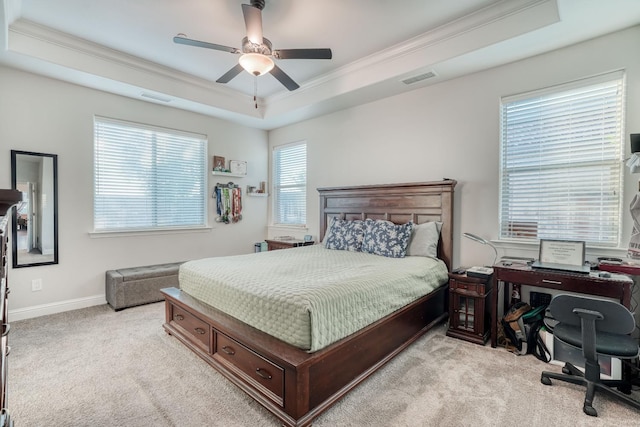 716 Mesa Dr S, Madera, CA 93636 - bedroom featuring a tray ceiling, crown molding, light carpet, an office area, and ceiling fan