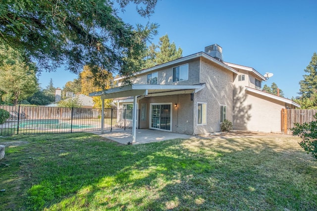 580 W Alluvial Ave, Clovis, CA 93611 - back of house featuring stucco siding, a patio area, and a chimney