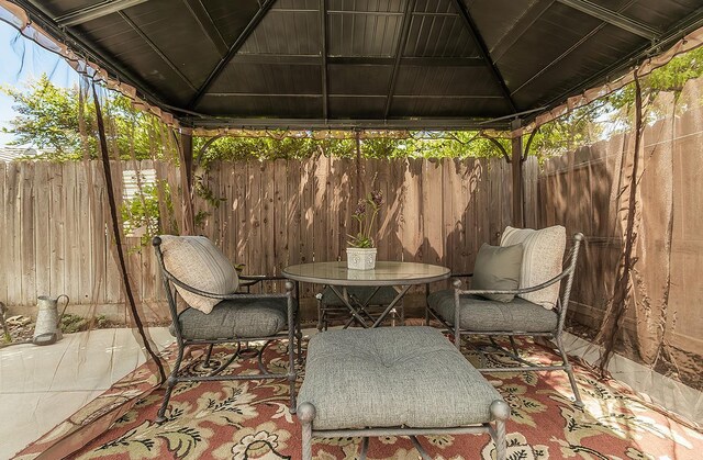 1073 E Pennsylvania Ave, Fresno, CA 93720 - view of patio featuring a gazebo and a fenced backyard