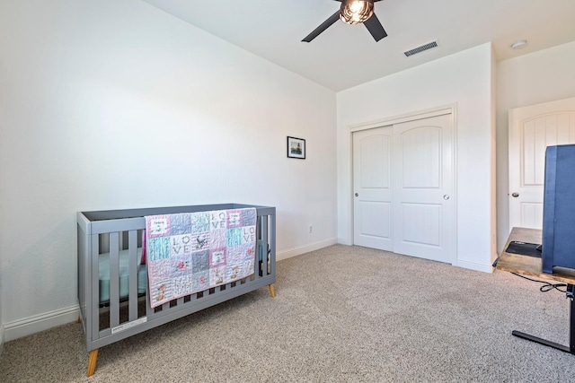 6772 E Ramona Way, Fresno, CA 93727 - carpeted bedroom with a closet, baseboards, and ceiling fan