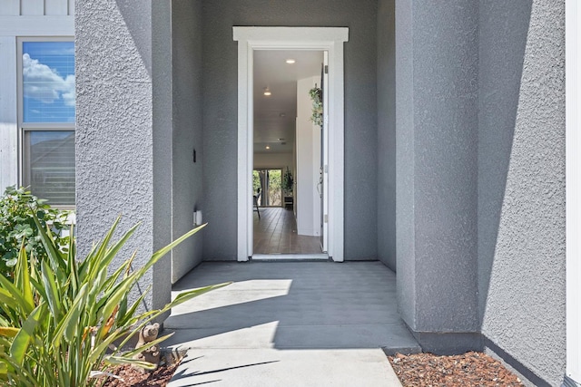 6772 E Ramona Way, Fresno, CA 93727 - view of exterior entry featuring stucco siding