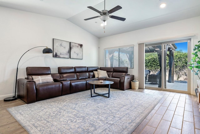 6772 E Ramona Way, Fresno, CA 93727 - living room featuring vaulted ceiling, wood finished floors, a ceiling fan, and baseboards
