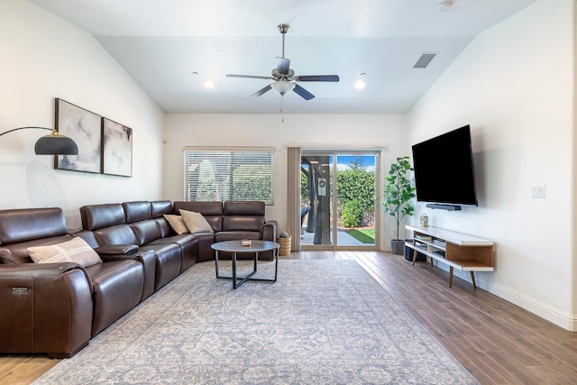 6772 E Ramona Way, Fresno, CA 93727 - living area with wood finished floors, ceiling fan, baseboards, and vaulted ceiling