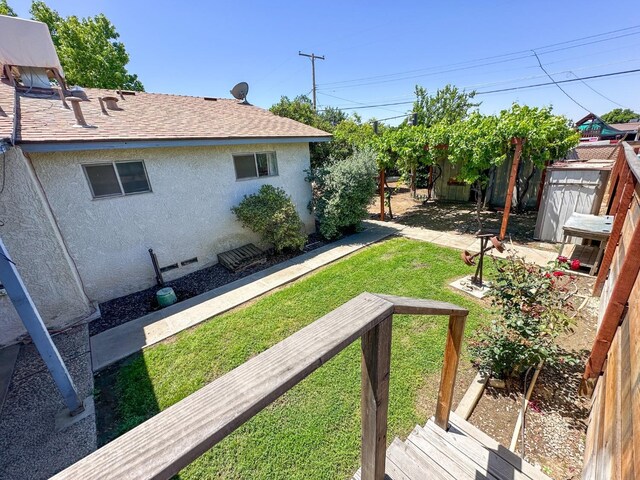 1482 W Thurman, Porterville, CA 93257 - view of grassy yard with an outbuilding