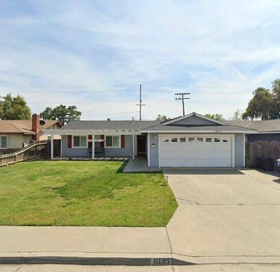 1035 Hoover Way, Hanford, CA 93230 - single story home featuring a garage and driveway