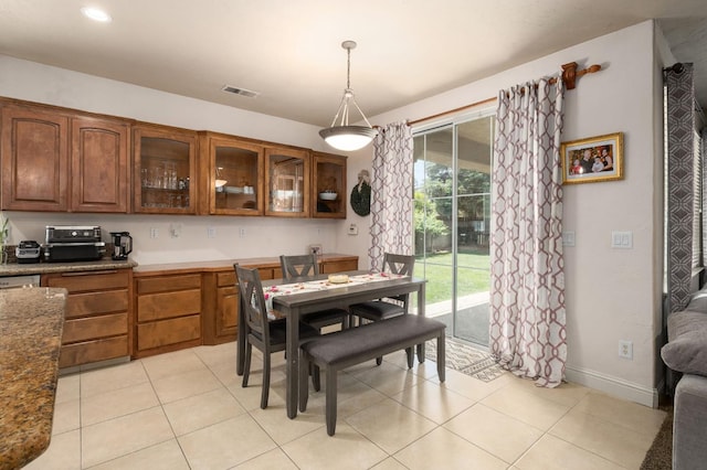 1710 N Filbert Ave, Clovis, CA 93619 - dining space with light tile patterned flooring, baseboards, and recessed lighting