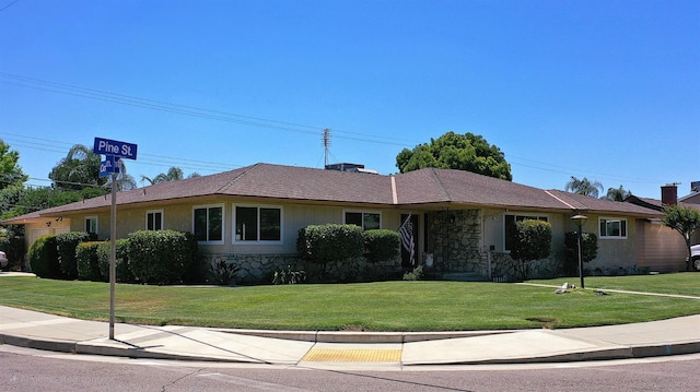 1205 Pine St, Selma, CA 93662 - single story home with stone siding and a front yard