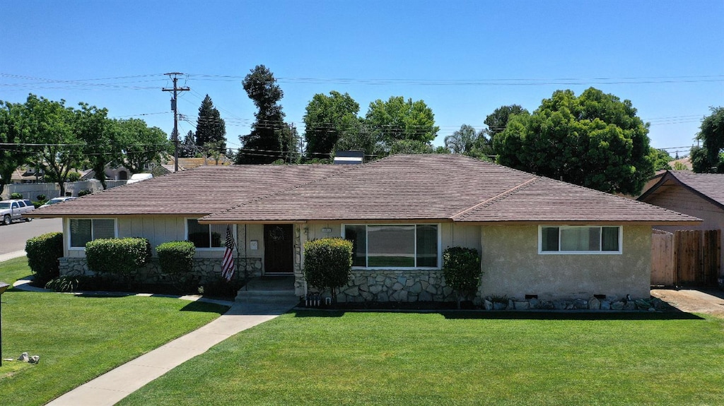 1205 Pine St, Selma, CA 93662 - view of front of property featuring stucco siding and stone siding