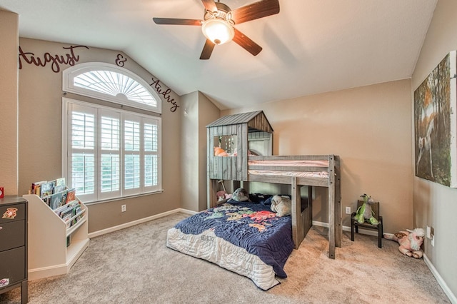 bedroom featuring lofted ceiling, carpet, ceiling fan, and baseboards